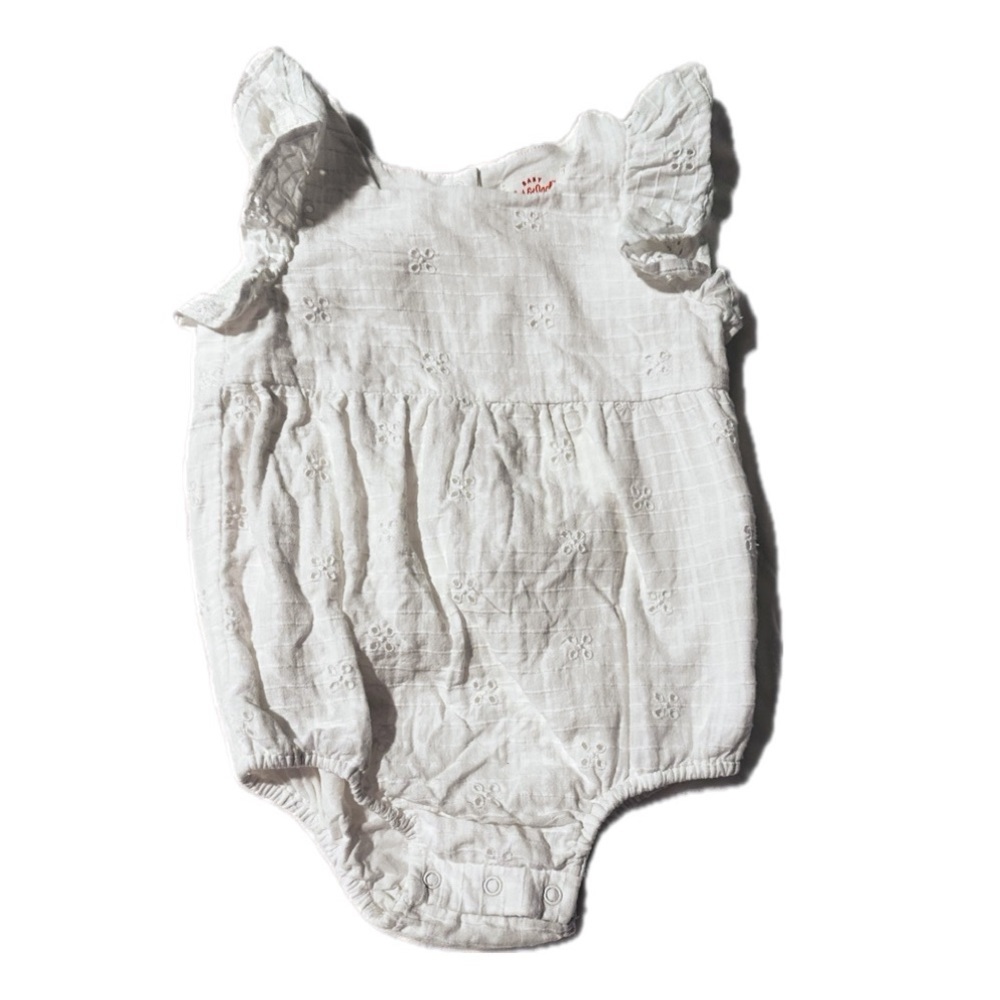White eyelet bubble romper new without tags.